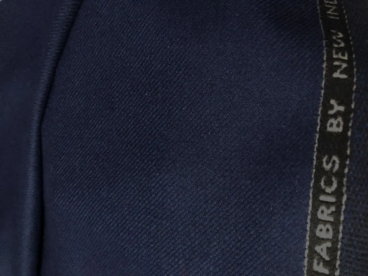 Wool x Nylon 270 gsm weight Suiting Fabric with twill weave available in 3 colors charcoal/black and ink blue